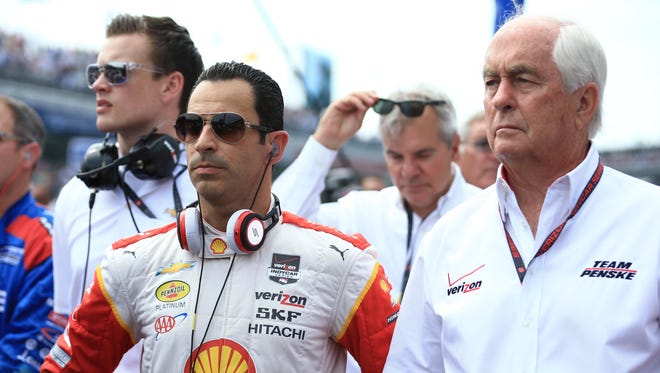 IndyCar Series driver Helio Castroneves (left) has given team owner Roger Penske three of his record 16 wins in the Indianapolis 500.