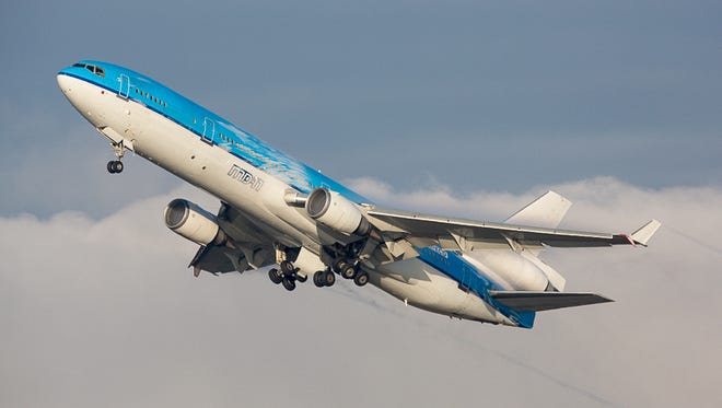 The MD-11 to fly regular commercial passenger flights takes off on its last flight ever. Here, it departs Seattle on Jan. 12, 2015, en route to an aircraft 'graveyard' in California.