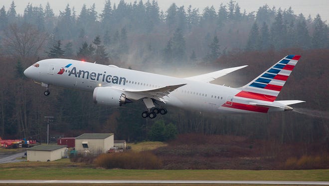 American Airlines' first Boeing 787-8 Dreamliner departs Paine Field in Everett, Wash., on its delivery flight to Dallas on Jan. 23, 2015.