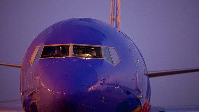 Pilots aboard a Southwest Boeing 737 prepare for an early-morning departure from San Diego on Feb. 7, 2015.
