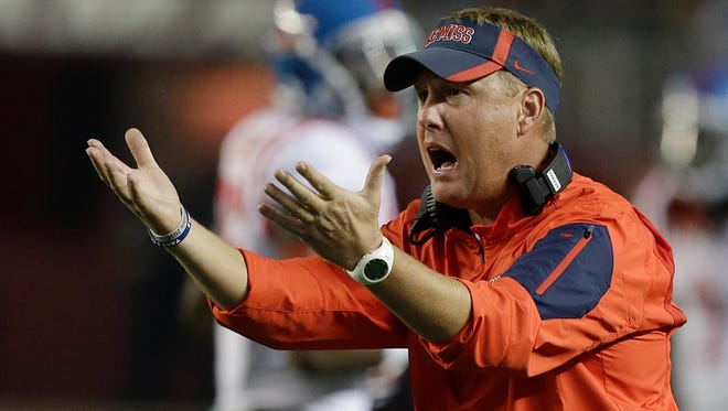 In this Sept. 19, 2015, file photo, Mississippi coach Hugh Freeze yells to his players during first half of an NCAA football game in Tuscaloosa, Ala. Rejuvenated Florida (4-0, 2-0) slipped back into the rankings this week at No. 25 and welcomes third-ranked Ole Miss (4-0, 2-0) to the Swamp in Gainesville on Saturday. (AP Photo/Butch Dill, File)