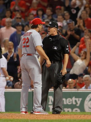 St. Louis Cardinals manager Mike Matheny (22) is ejected from the game as they take on the Boston Red Sox in the ninth inning at Fenway Park.