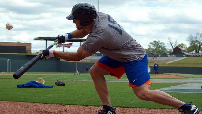 April 6: Tim Tebow practices his bunting during batting practice.