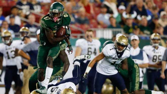 South Florida wide receiver Rodney Adams (87) runs after a catch in the second half against Navy.