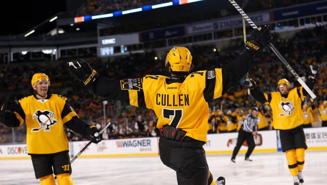 Matt Cullen (7) of the Pittsburgh Penguins celebrates after scoring a goal during the third period of the game against the Philadelphia Flyers at Heinz Field.