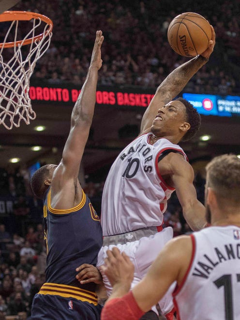 Oct. 28: Raptors guard DeMar DeRozan (10) throws down a vicious one-handed dunk over Cavs defender Tristan Thompson (13).