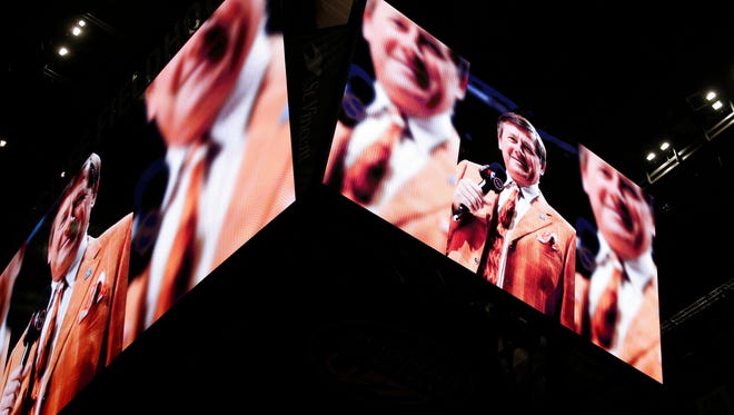 Photos of Craig Sager are shown  during a moment of silence for the television announcer before the Washington Wizards play against the Indiana Pacers at Bankers Life Fieldhouse.