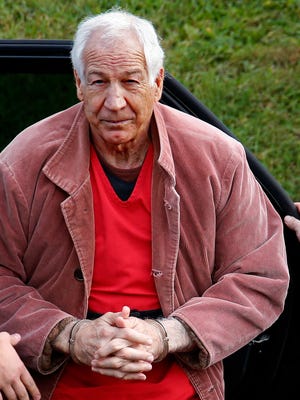Former Penn State University assistant football coach Jerry Sandusky arrives for an appeal hearing at the Centre County Courthouse in Bellefonte, Pa.