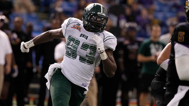 Dec 23, 2013; St. Petersburg, FL, USA;Ohio Bobcats defensive lineman Tarell Basham (93) rushes against the East Carolina Pirates  during the second half at the 2013 Beef O Bradys Bowl at Tropicana Field. Eastern Carolina Pirates defeated the Ohio Bobcats 37-20. Mandatory Credit: Kim Klement-USA TODAY Sports