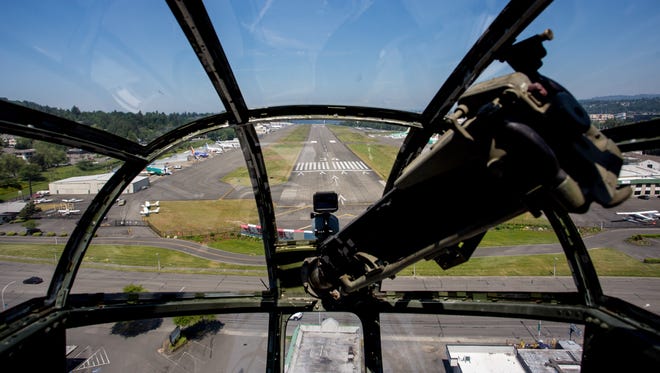 Runway 34 at Renton Municipal Airport fills the windscreen of a World War II-era B25 on approach to the small airport in May 2017.