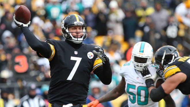 Pittsburgh Steelers quarterback Ben Roethlisberger (7) throws the ball against the Miami Dolphins during the first half in the AFC Wild Card playoff football game at Heinz Field.