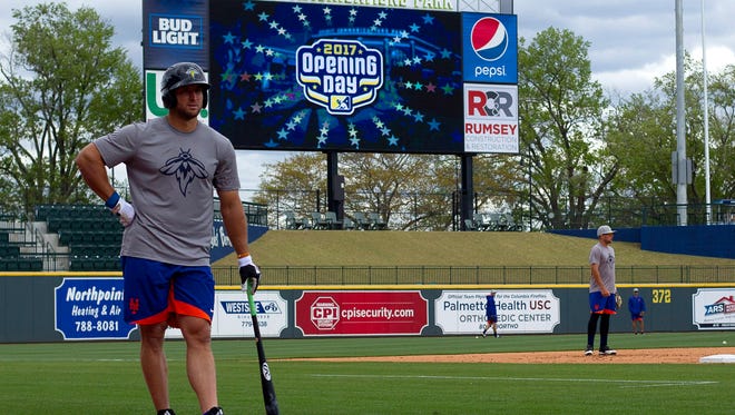 April 6: Tim Tebow waits his turn to hit.