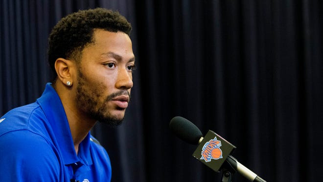 Derrick Rose speaks during a news conference for the New York Knicks to announce they acquired him from the Chicago Bulls at Madison Square Garden in New York.