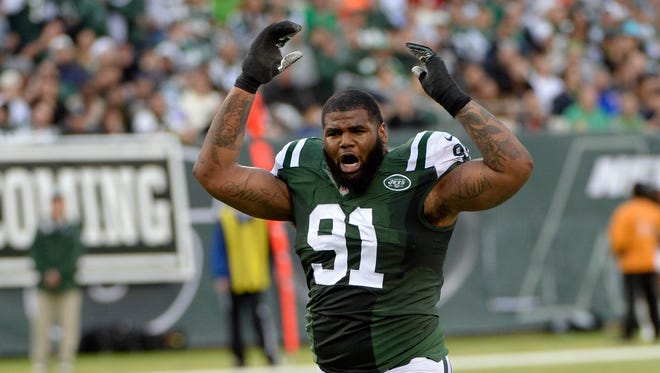 New York Jets defensive end Sheldon Richardson (91) reacts after being called for a personal foul in the first half against the Cleveland Browns during the game at MetLife Stadium.