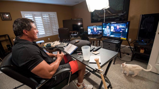 Jose Canseco works remotely out of his home in Las Vegas.