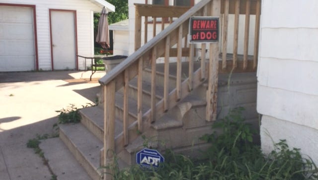 Beware of dog signs are posted on the home of Tina Jones in the 1100 block of Reber Street.