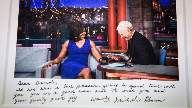 A photo of David Letterman with Michelle Obama donated to Ball State's Bracken Library archives.