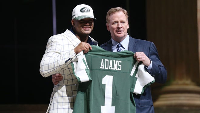 Jamal Adams (LSU) poses with NFL commissioner Roger Goodell (right) as he is selected as the number 6 overall pick to the New York Jets in the first round the 2017 NFL Draft at the Philadelphia Museum of Art on Thursday night.