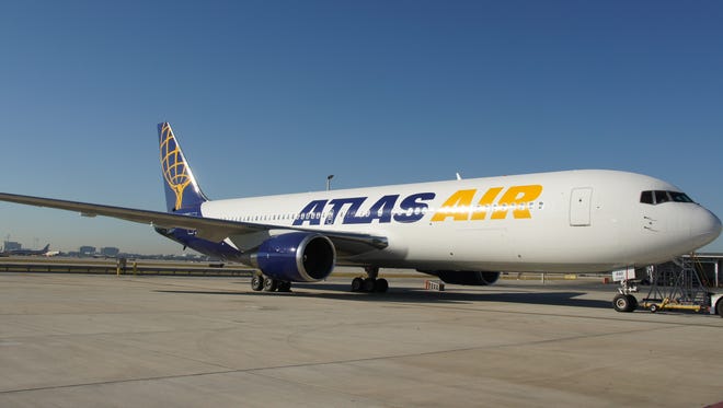 A Boeing 767 cargo jet owned by Atlas Air. Amazon leased 20 of the jets on May 5, 2016 to further build out its air cargo network. It also will take as much as a 20% stake in the company.