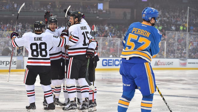 Chicago Blackhawks defenseman Michal Kempny (6) is congratulated by teammates after scoring in the first period.