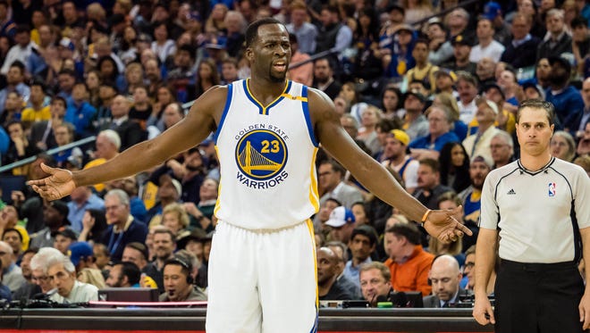 Draymond Green reacts against the Utah Jazz during the third quarter at Oracle Arena.