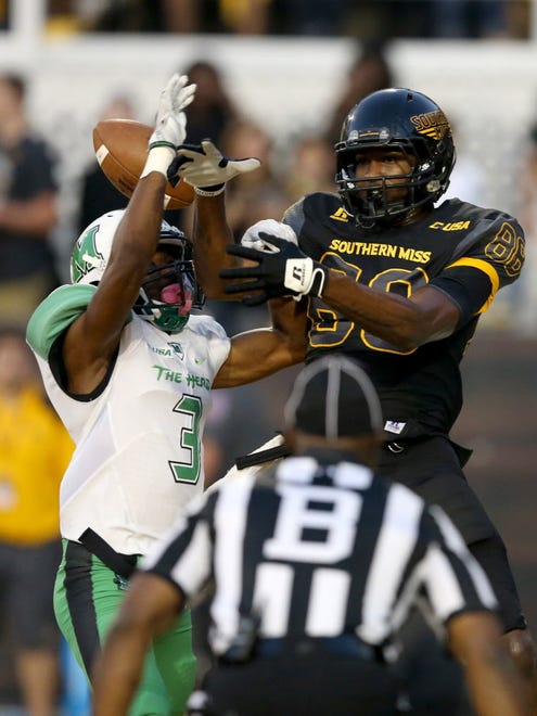 Marshall defensive back Chris Jackson (3) breaks up a pass intended for Southern Miss wide receiver Isaiah Jones (88) in the first quarter.