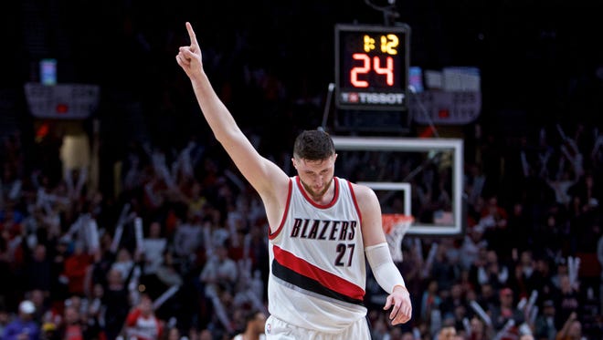 Trail Blazers center Jusuf Nurkic reacts after scoring during a regular-season game against the Nuggets.