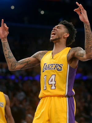 Brandon Ingram (14) reacts after scoring a basket against the New Orleans Pelicans during the second half at Staples Center.