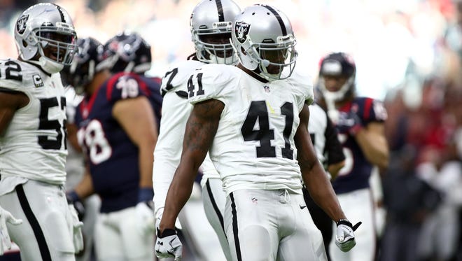 Oakland Raiders defensive back Brynden Trawick (41) celebrates during the first half of the AFC Wild Card playoff football game against the Houston Texans at NRG Stadium.