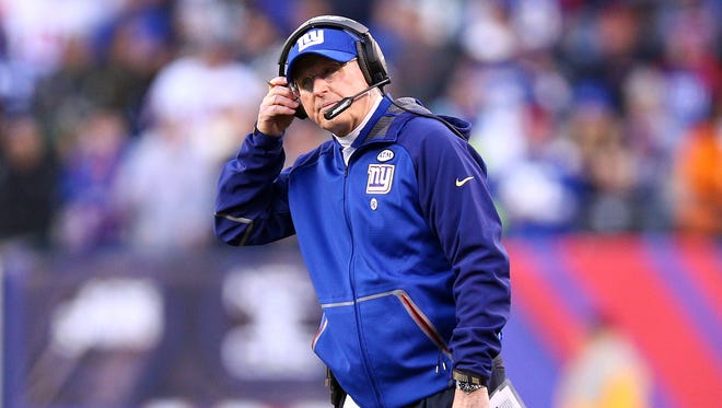 New York Giants head coach Tom Coughlin reacts during the fourth quarter against the New York Jets at MetLife Stadium.