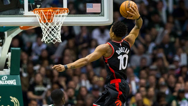 Toronto Raptors guard DeMar DeRozan (10) dunks during the third quarter against the Milwaukee Bucks in game four of the first round of the 2017 NBA Playoffs at BMO Harris Bradley Center.