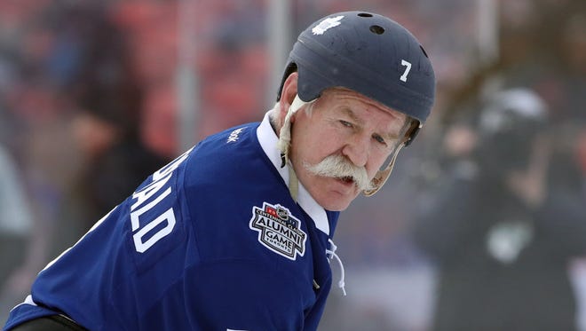 Maple Leafs forward Lanny McDonald (7) gets ready for before the start of the Centennial Classic Alumni Game.