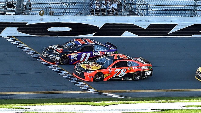 Hamlin (11) made a bold pass of Matt Kenseth on the final lap of the 2016 Daytona 500, then beat Martin Truex Jr. (78) to the line by 0.011 seconds, the closest finish in the race's history.
