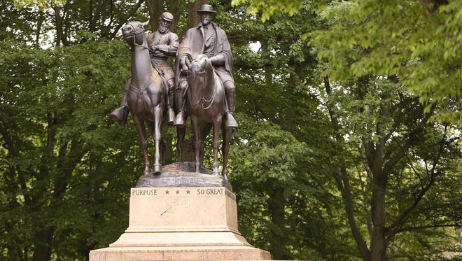 A monument featuring Thomas J. "Stonewall" Jackson, left, and Robert E. Lee stands in Wyman Park in Baltimore, Md. near Johns Hopkins University. The monument was a gift from J. Henry Ferguson, a prominent local banker. Jackson and Lee were childhood heroes of Ferguson.