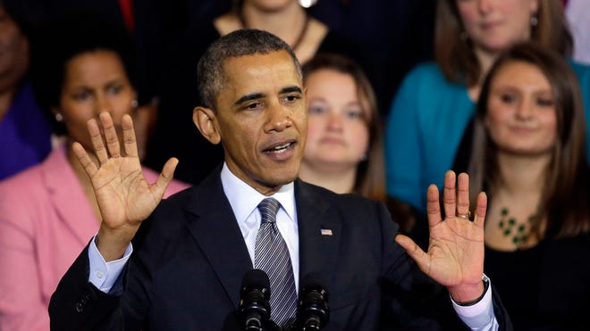 President Obama speaks at Boston's Faneuil Hall Oct. 30 about the federal health care law.