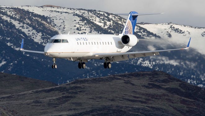 A United Airlines Bombardier CRJ-200 lands at Reno-Tahoe Airport on Feb. 14, 2016.