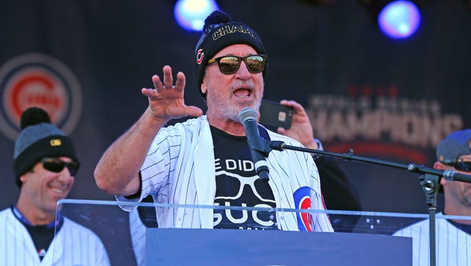 Chicago Cubs manager Joe Maddon talks during the World Series victory rally in Grant Park.