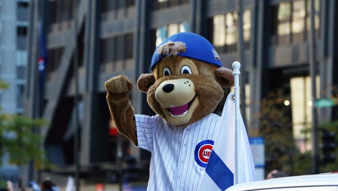 Clark, the Cubs' mascot, during the parade on Michigan Avenue.