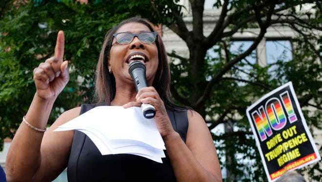 New York Public Advocate Letitia James speaks to protestors of a travel ban in Union Square, in New York.