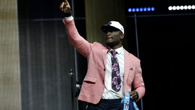 Western Michigan's Corey Davis reacts after being selected by the Tennessee Titans during the first round of the 2017 NFL football draft, Thursday, April 27, 2017, in Philadelphia.