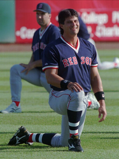Jose Canseco spends two seasons (1995-96) with the Red Sox, bashing a combined 52 home runs.