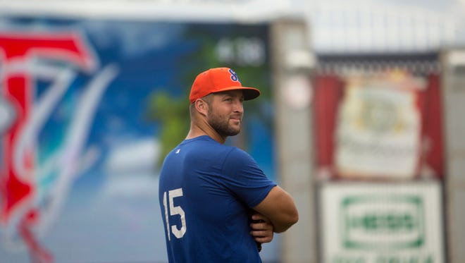 Aug. 10, 2017: Tim Tebow waits for teammates to begin practice, following a news conference at Steinbrenner Field in Tampa.
