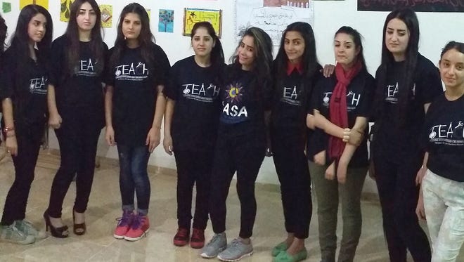 Rafed Yaldo recently returned from a nearly two-week visit to northern Iraq, where he met students wearing T-shirts of the Teachers Educating and Creating Hope (TEACH) group.