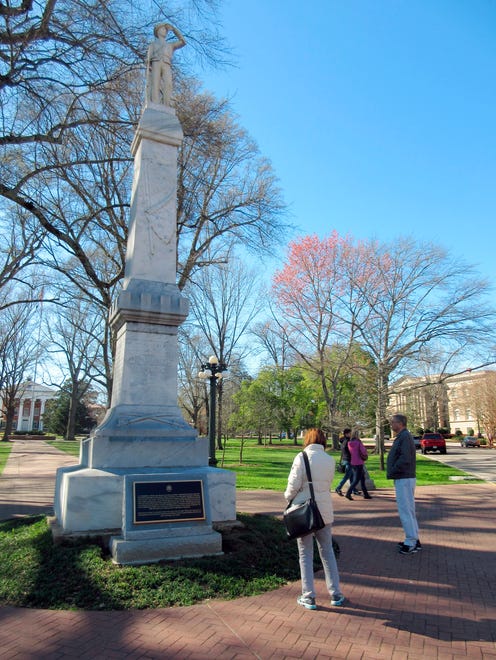 This March 12, 2017 photo shows a statue of a Confederate soldier on the campus of the University of Mississippi in Oxford, Miss. Another statue on campus honors James Meredith, an African-American student whose enrollment in 1962 sparked riots.