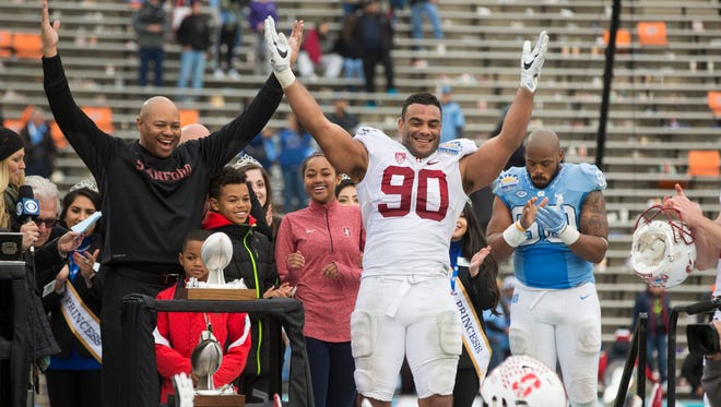 Stanford Cardinal defensive lineman Solomon Thomas (90) celebrates with head coach David Shaw (L) after defeating the North Carolina Tar Heels 25-23 at Sun Bowl Stadium. Thomas was named MVP of the game. Mandatory Credit: Ivan Pierre Aguirre-USA TODAY Sports

 ORG XMIT: USATSI-326334 ORIG FILE ID:  20161230_ads_sa9_146.JPG