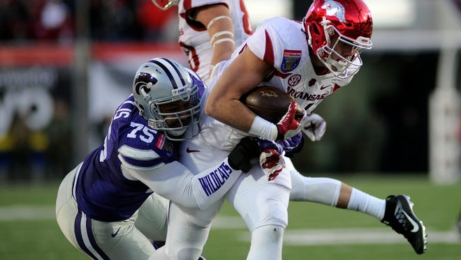 The Bengals took Kansas State Wildcats defensive end Jordan Willis, left, in the third round of the 2017 NFL Draft.