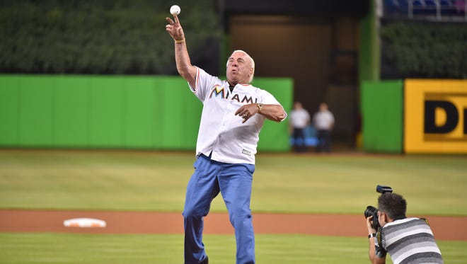 Ric Flair throws out the first pitch before the start of a Miami Marlins game on July 28, 2017.