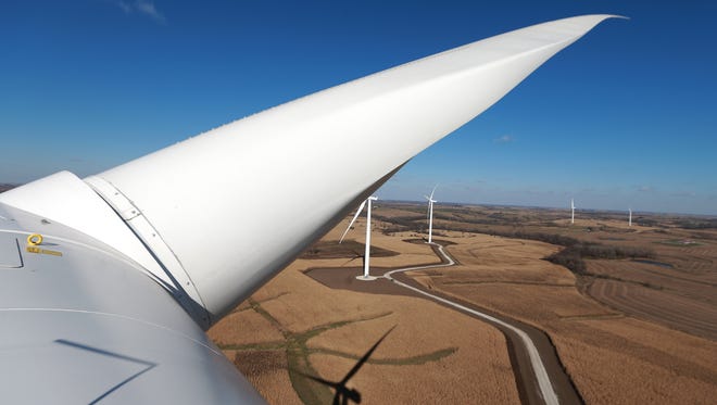 Turbines line the Madison County countryside as seen from the top of a wind turbine in rural Macksburg.