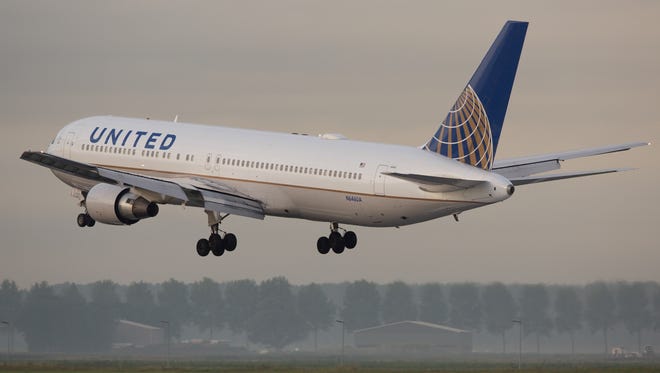 A United Airlines Boeing 767-300 lands at Amsterdam Schiphol Airport in August 2016.