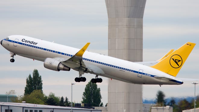 Condor's retro-painted Boeing 767-300 lifts off from Seattle-Tacoma International Airport for Frankfurt, Germany, on May 18, 2017.